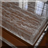 F02. Berndhardt "Arctic" acrylic and polished steel cocktail table. 17"h x 55"w x 27"d 